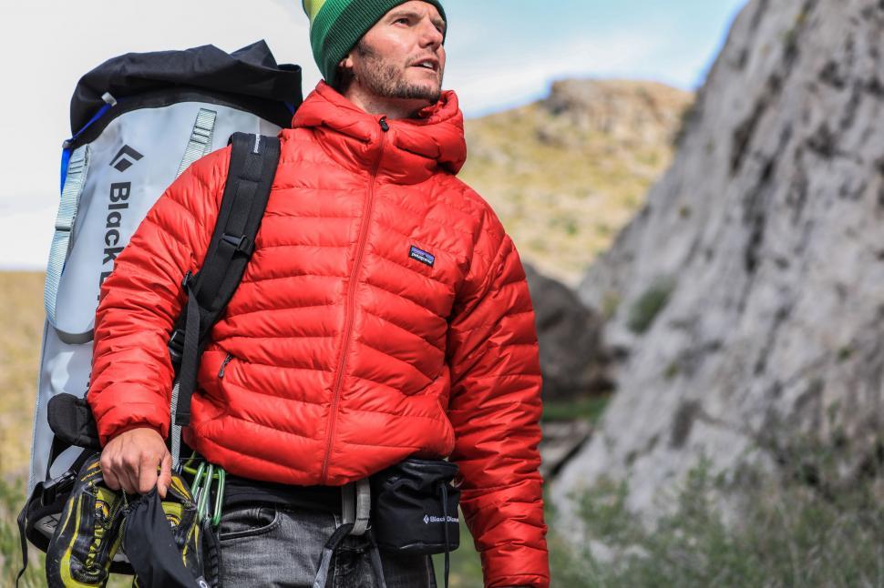 Free Image of Man in Red Jacket and Green Hat 