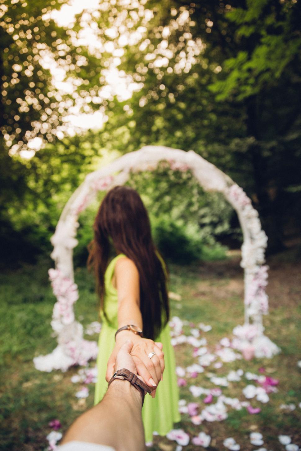 Free Image of Person Holding the Hand of Another Person 