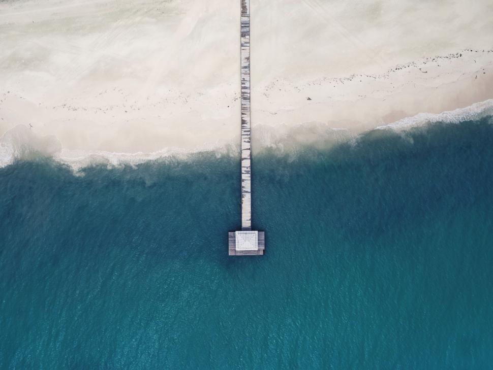 Free Image of Aerial View of a Pier in the Middle of the Ocean 