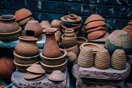 Traditional Indian Potter Making Clay Pot On Manual Pottery Wheel