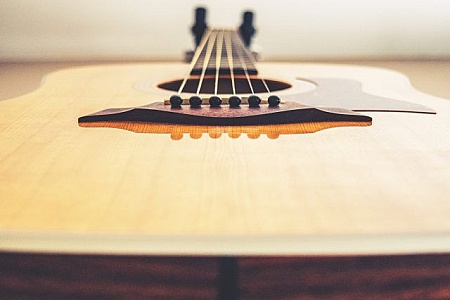 Close up of ukulele neck with triangle inlays Stock Photo - Alamy