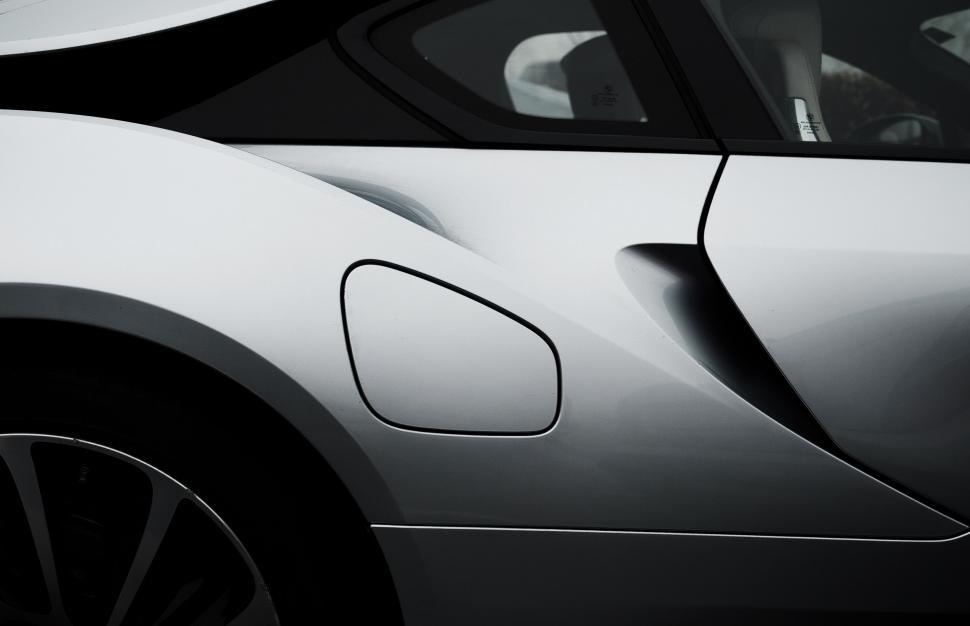 Free Image of Black and White Photo of a Sports Car 