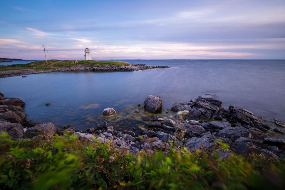 Free Image of Water Body With Lighthouse 