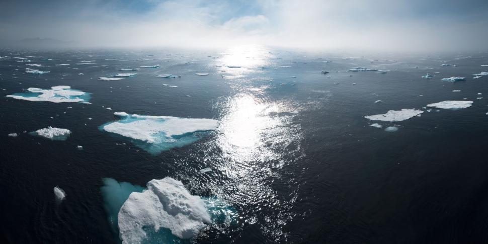 Free Image of Aerial View of Ocean With Ice Floes 