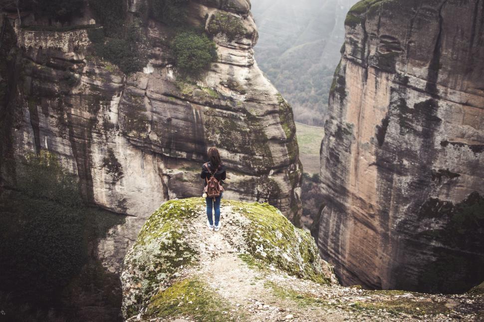 Free Image of Person Standing on Top of Cliff 