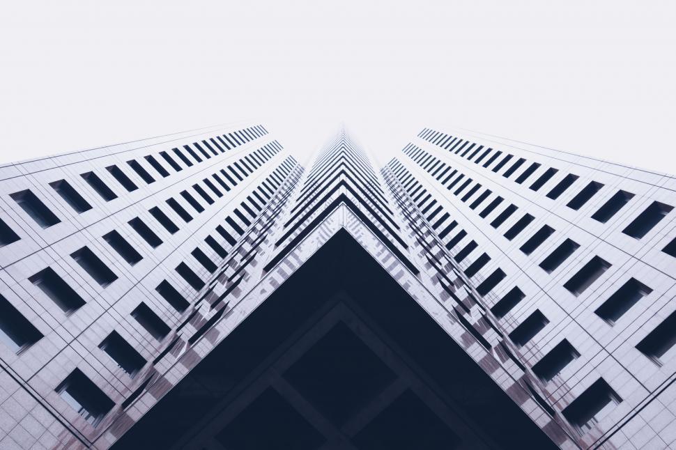 Free Image of Two Tall Buildings Seen From Ground Level 