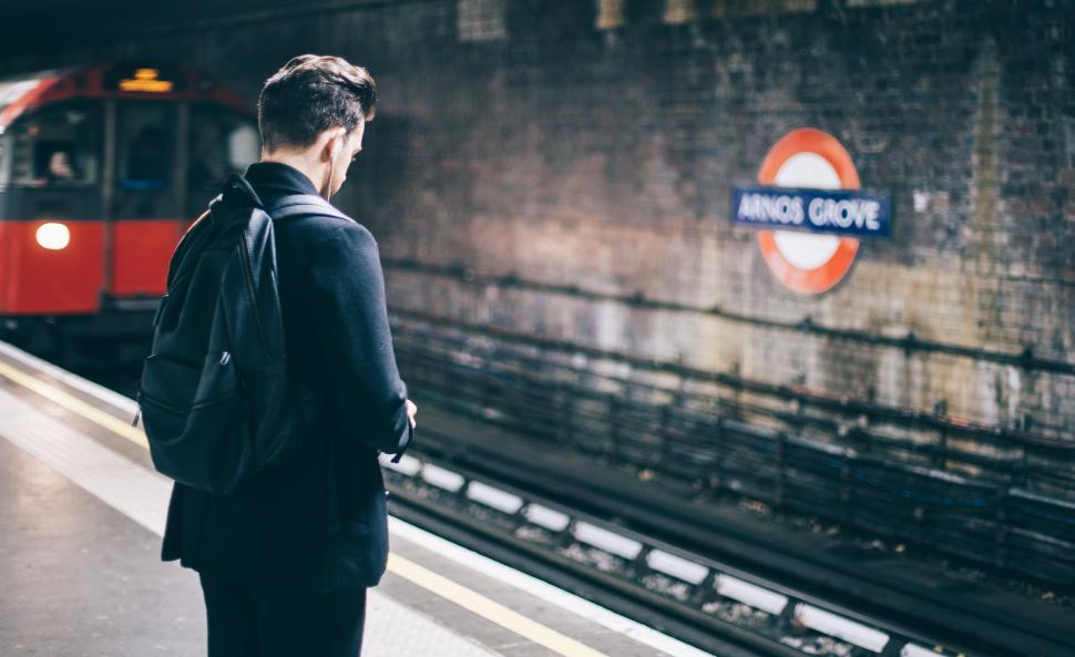 Free Image of Man Waiting for Train at Train Station 