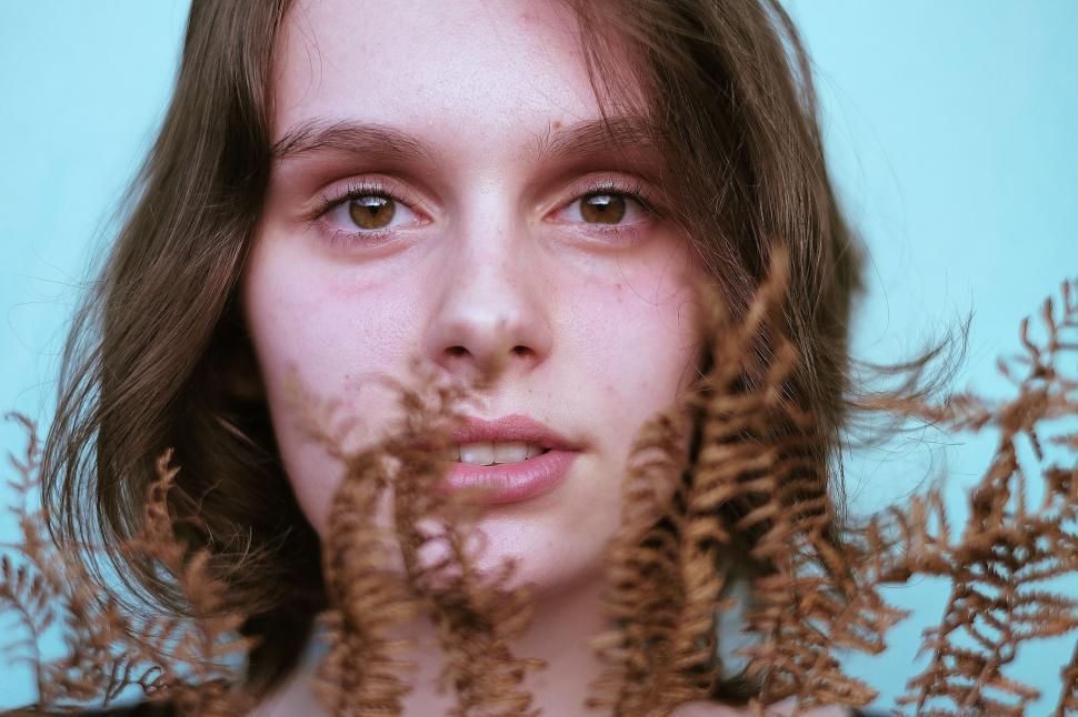 Free Image of Woman With Freckles of Hair on Face 