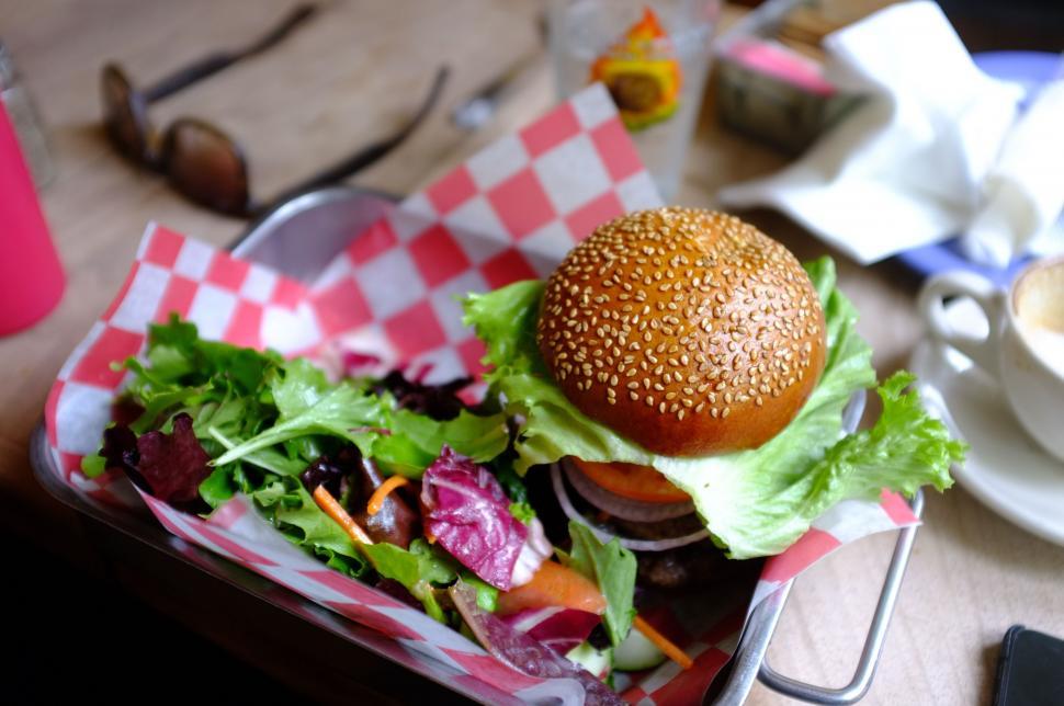Free Image of Hamburger and Salad Basket on Table 