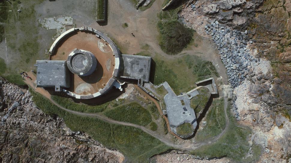 Free Image of Aerial View of Building in Rocky Area 