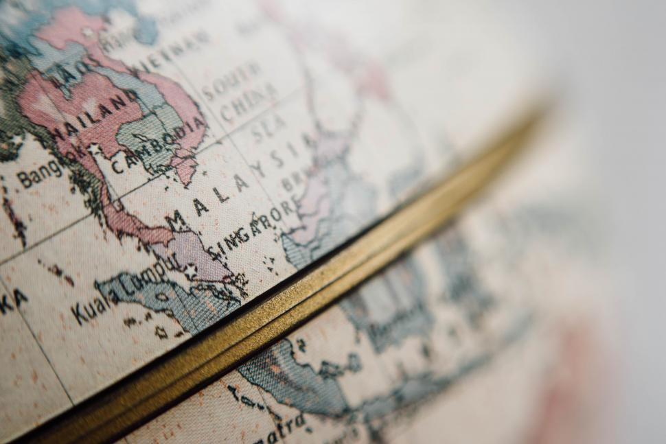 Free Image of Close Up of a World Globe With Gold Border 