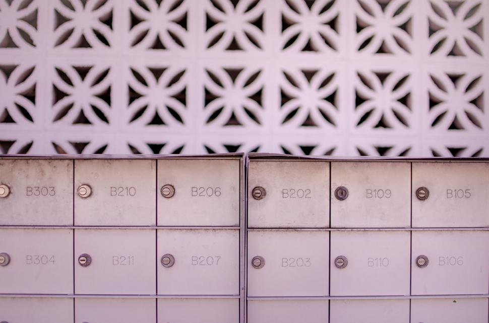 Free Image of Row of White Mailboxes 