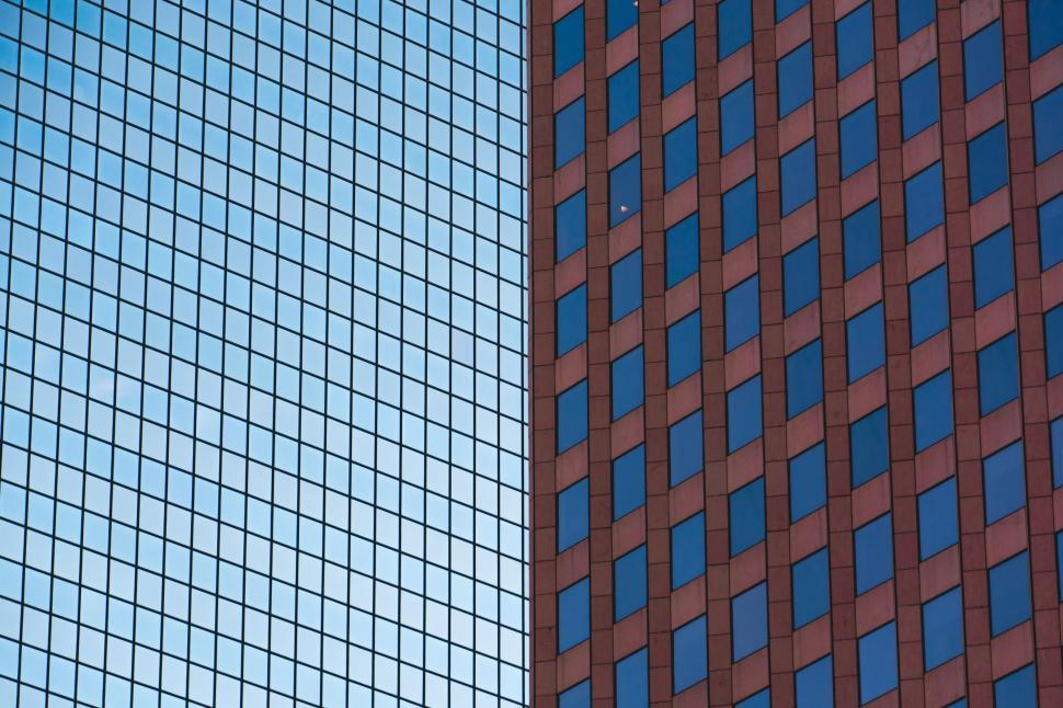 Free Image of Tall Red and Blue Buildings in Urban Setting 