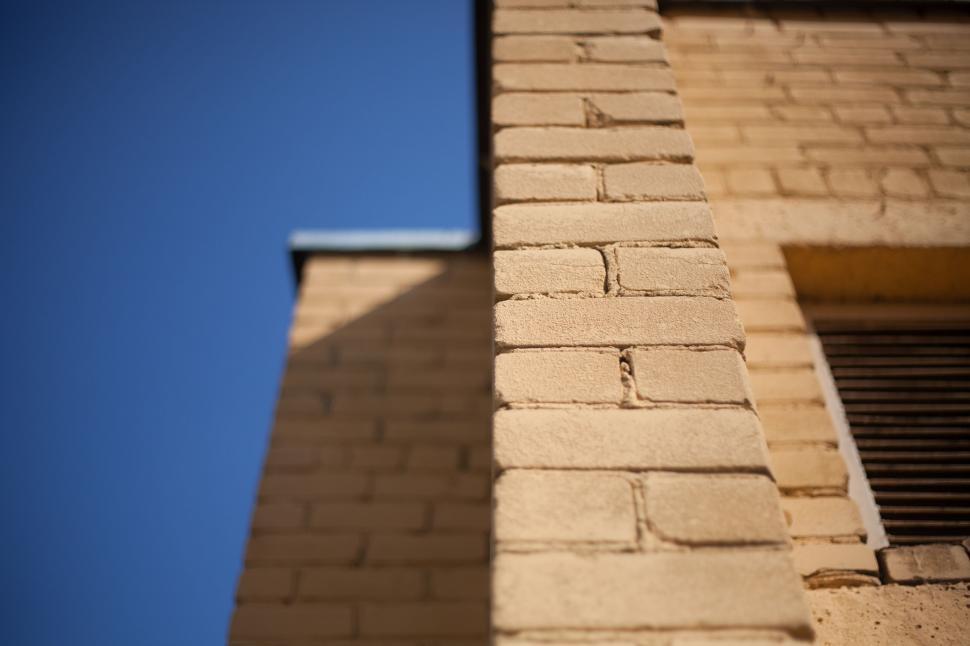 Free Image of Brick Building With Blue Sky 