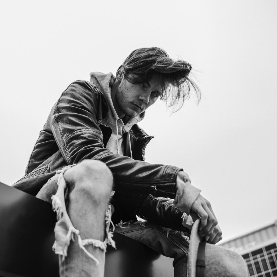 Free Image of Man Sitting on Horse Next to Building 
