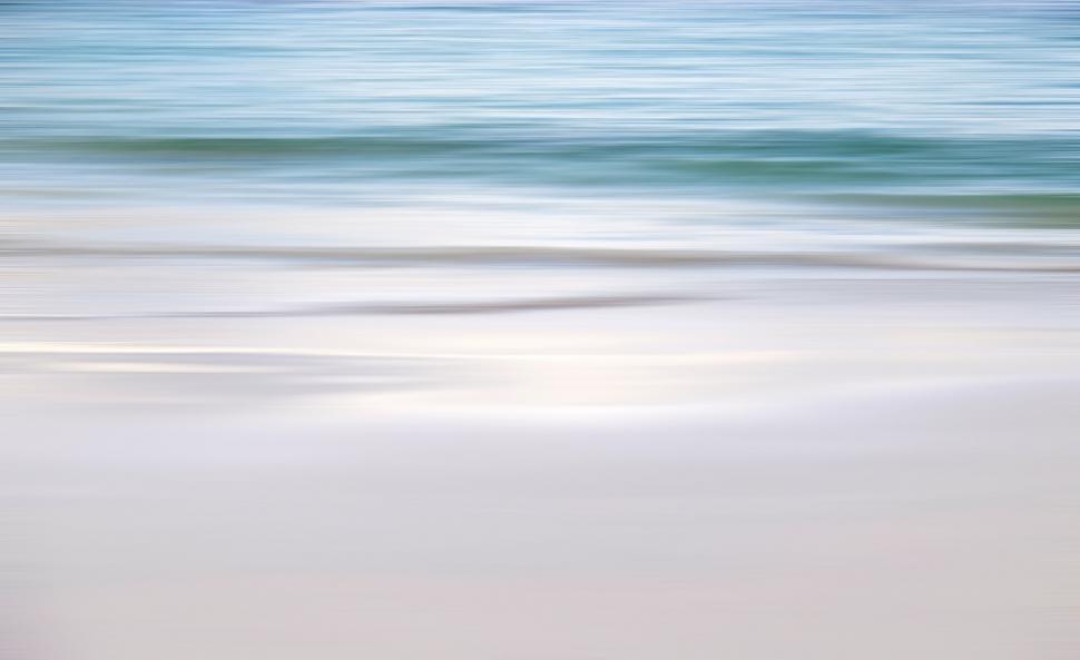 Free Image of Blurry Person Walking on Beach 