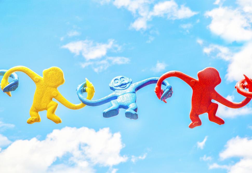 Free Image of Group of Monkey Kites Flying in the Sky 