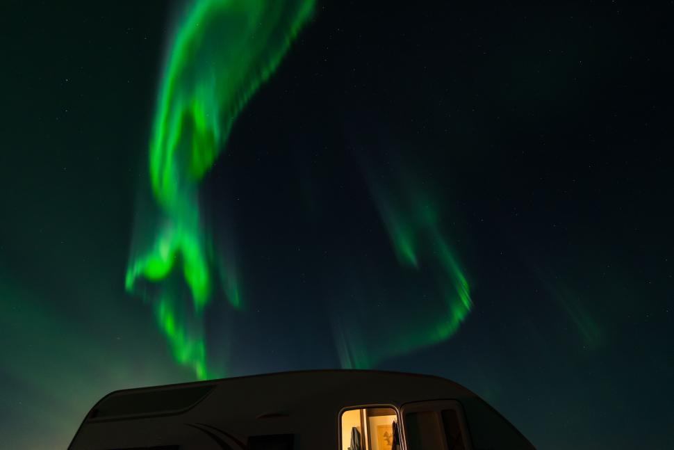 Free Image of Vibrant Green and Black Aurora Dancing in the Night Sky 