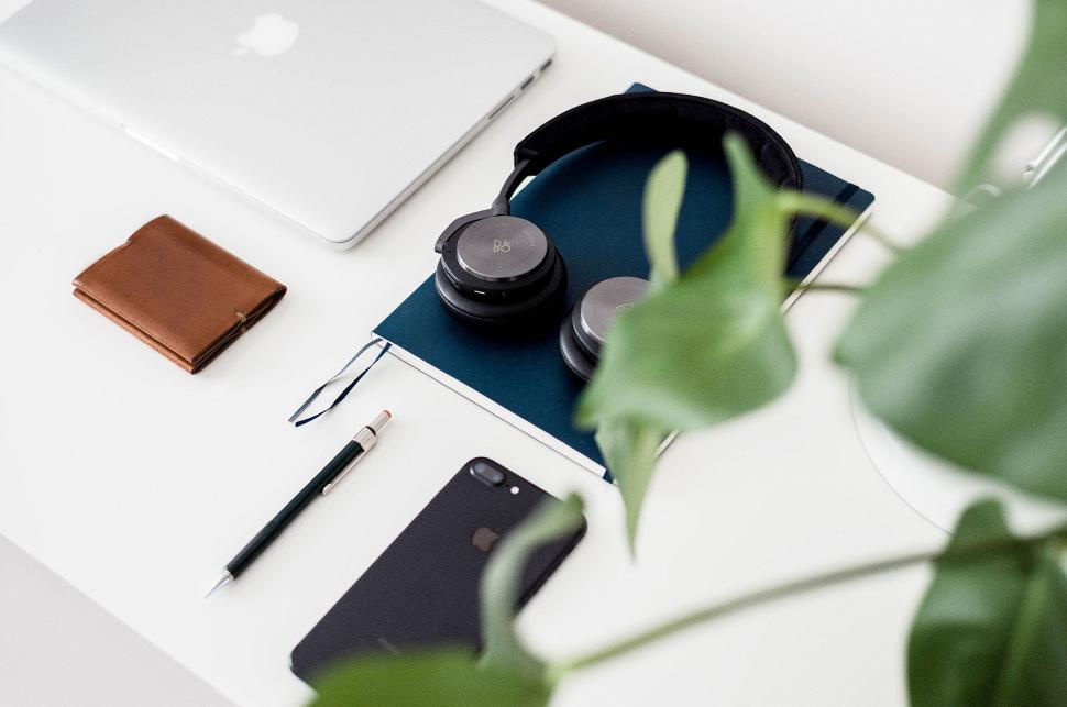 Free Image of White Desk With Laptop and Plant 