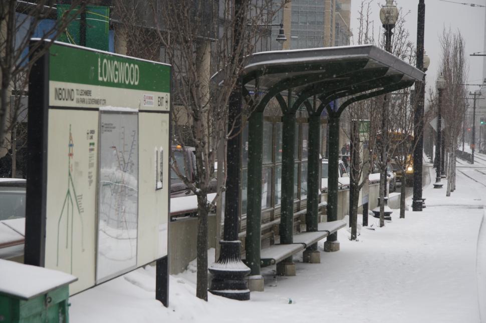 Free Image of Snow-Covered Bus Stop on Street 