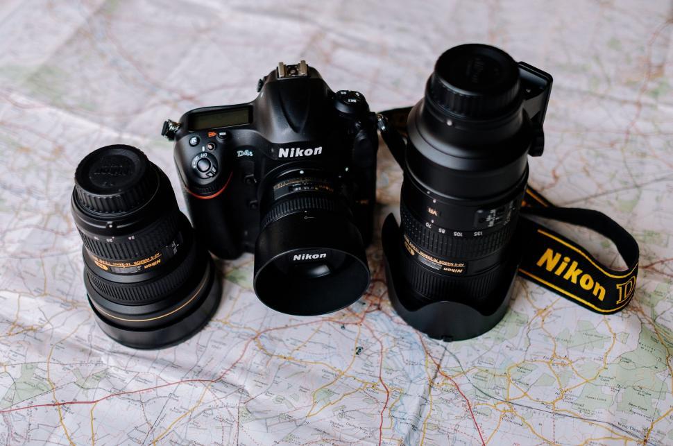 Free Image of Cameras on Map: Travel Planning 