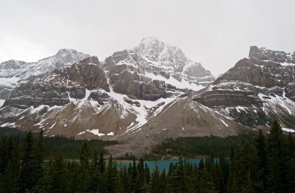 Free Image of Snow Covered Mountain Range With Lake 
