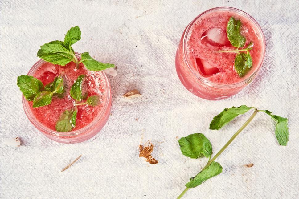 Free Image of Two Glasses of Watermelon and Mint on a Towel 