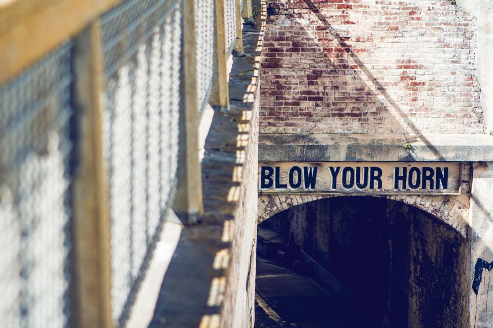 Free Image of Blow Your Horn on a Bridge 