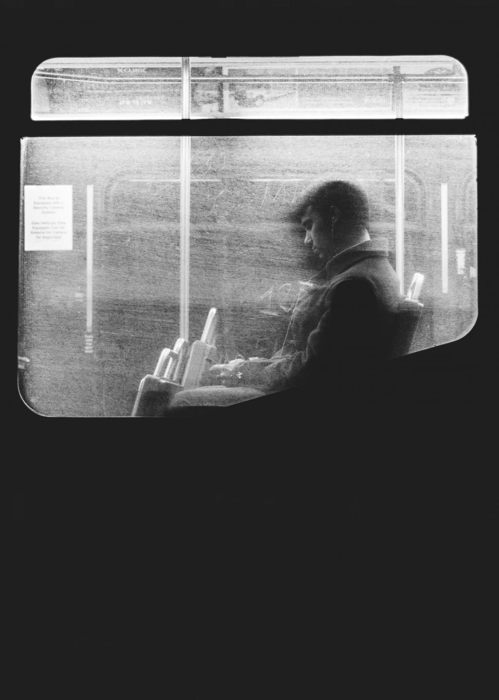 Free Image of Person Sitting on Train 