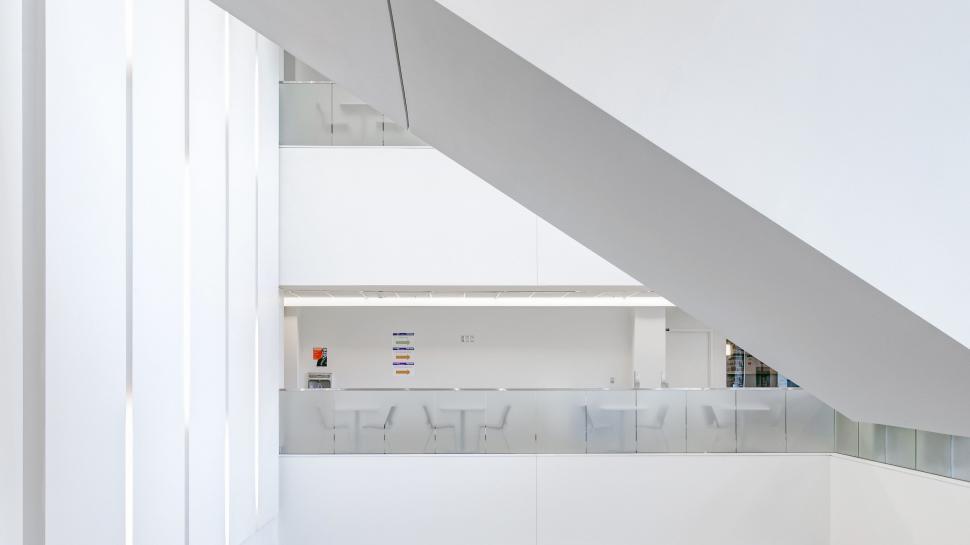 Free Image of White Room With Staircase and Window 