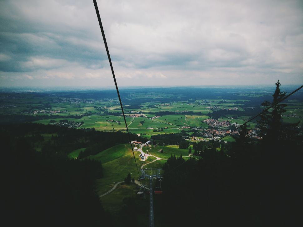 Free Image of A View of a Valley From a Ski Lift 