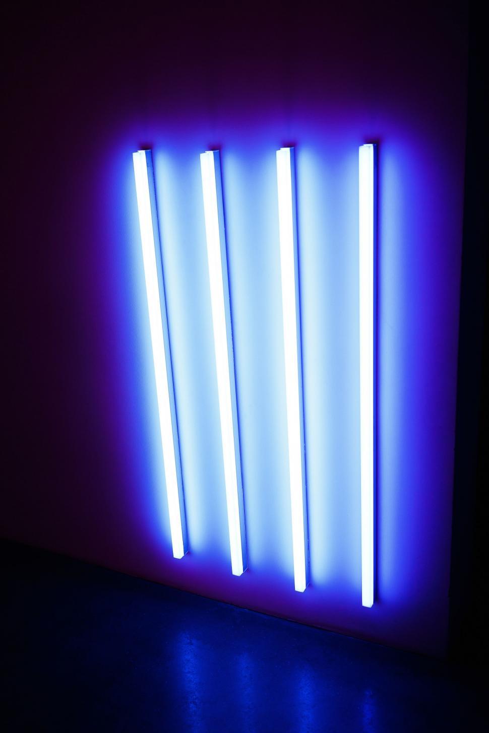 Free Image of Blue Light Shining in Dark Room 