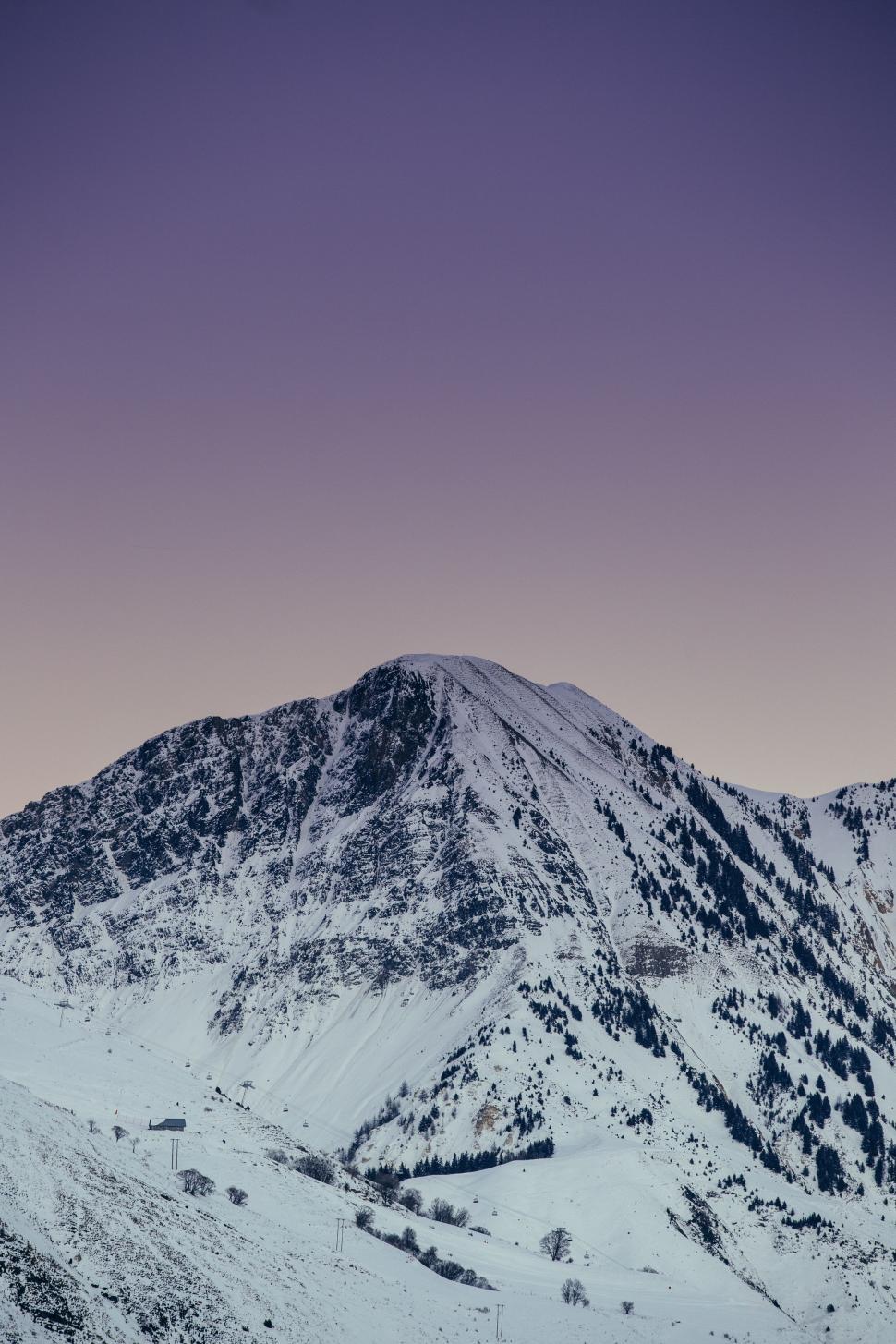 Free Image of Snow-covered Mountain Under Purple Sky 