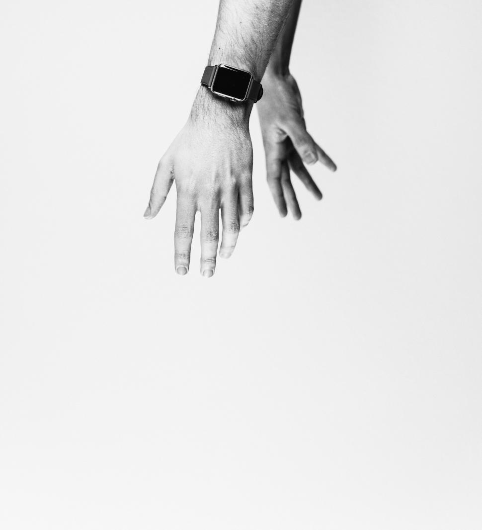 Free Image of Persons Hand With Watch in Black and White 