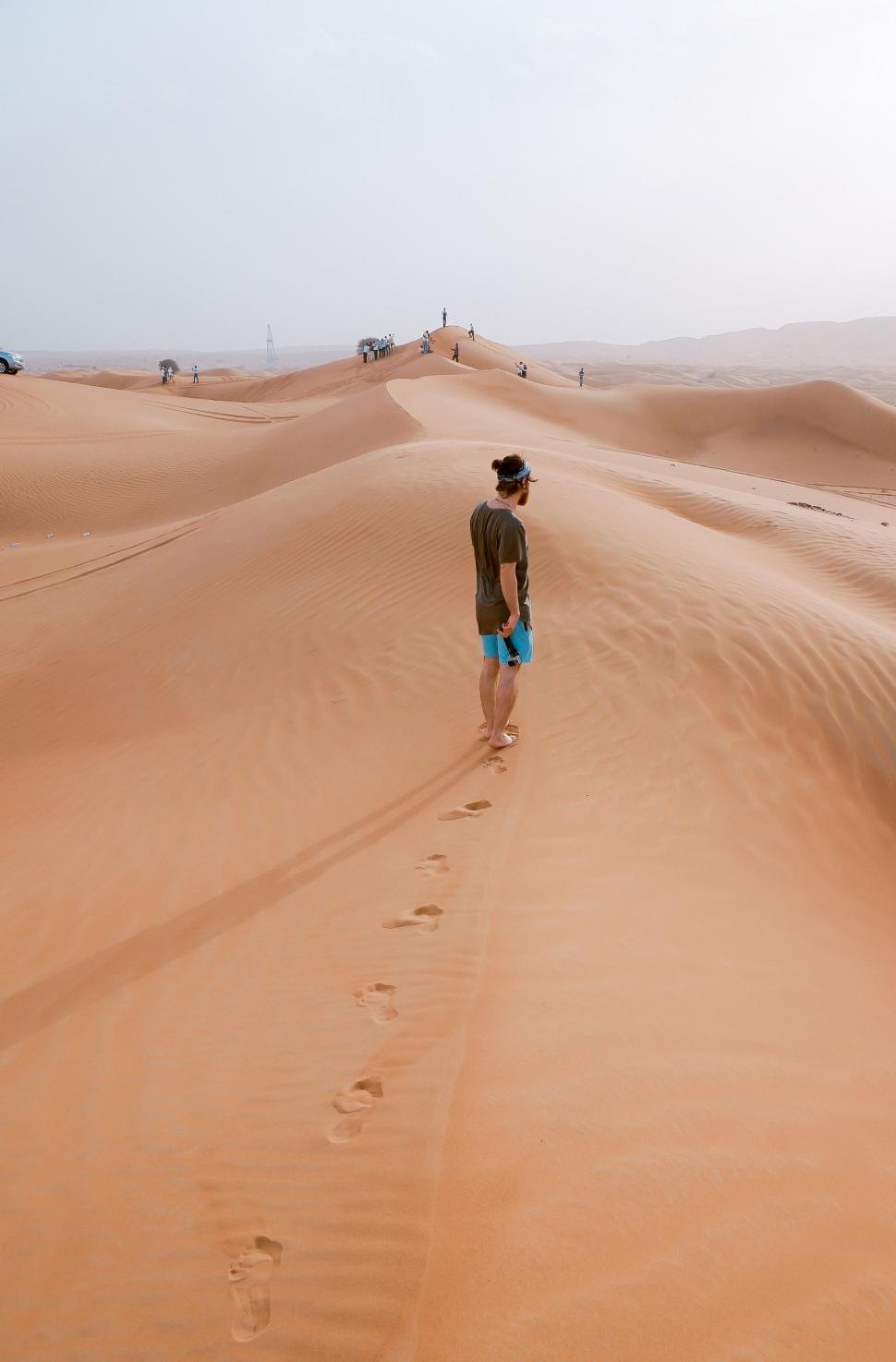 Free Image of Man Standing in Desert 