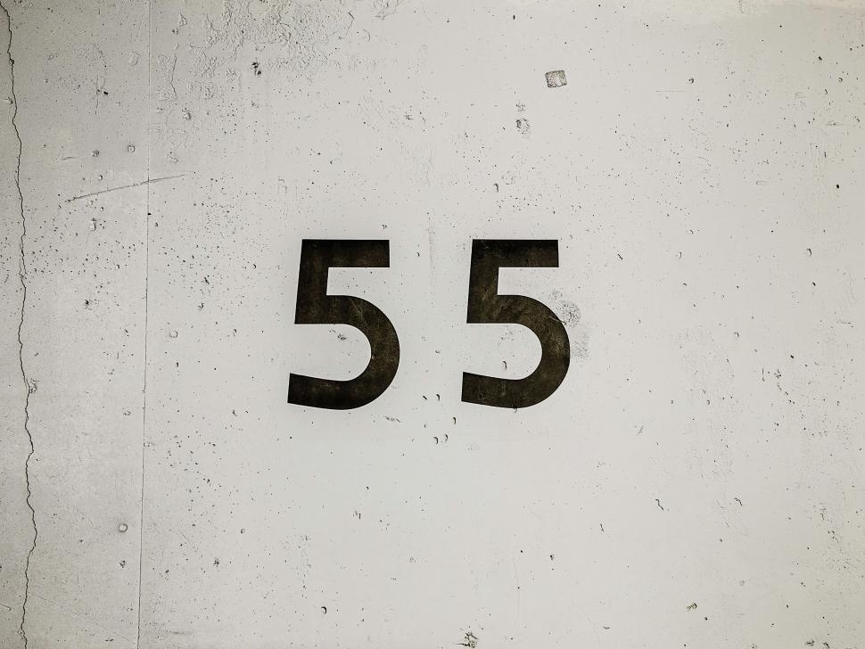Free Image of Close Up of Number 55 on Wall 