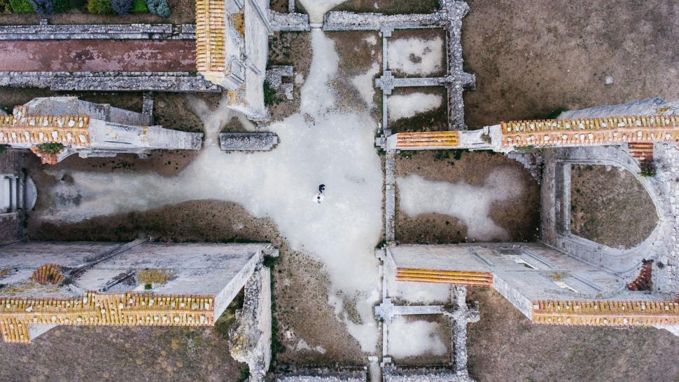 Free Image of Aerial View of Building With Snow on Ground 