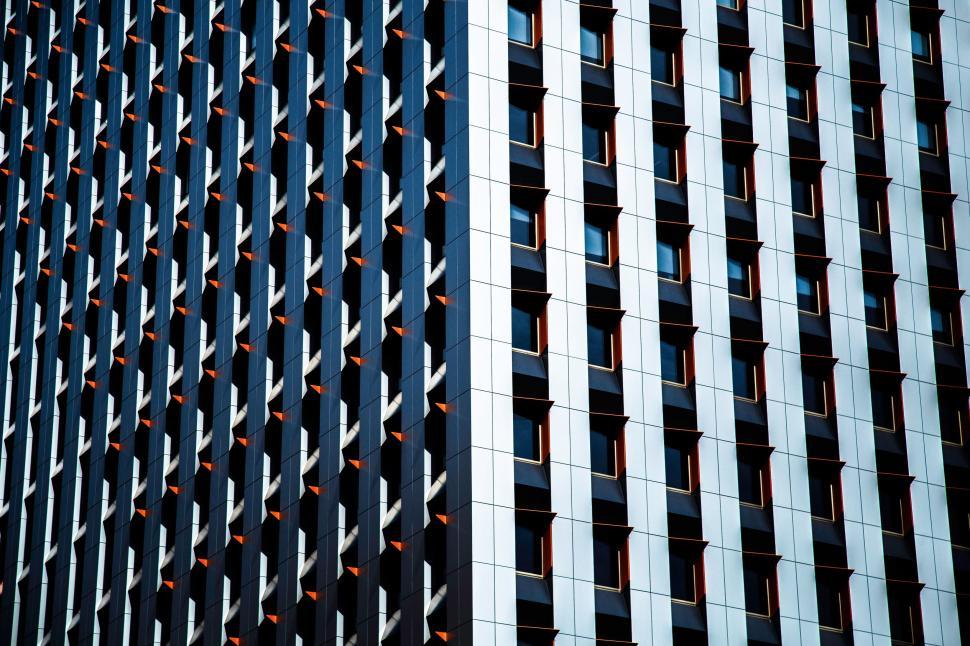Free Image of Close Up of Tall Building With Many Windows 