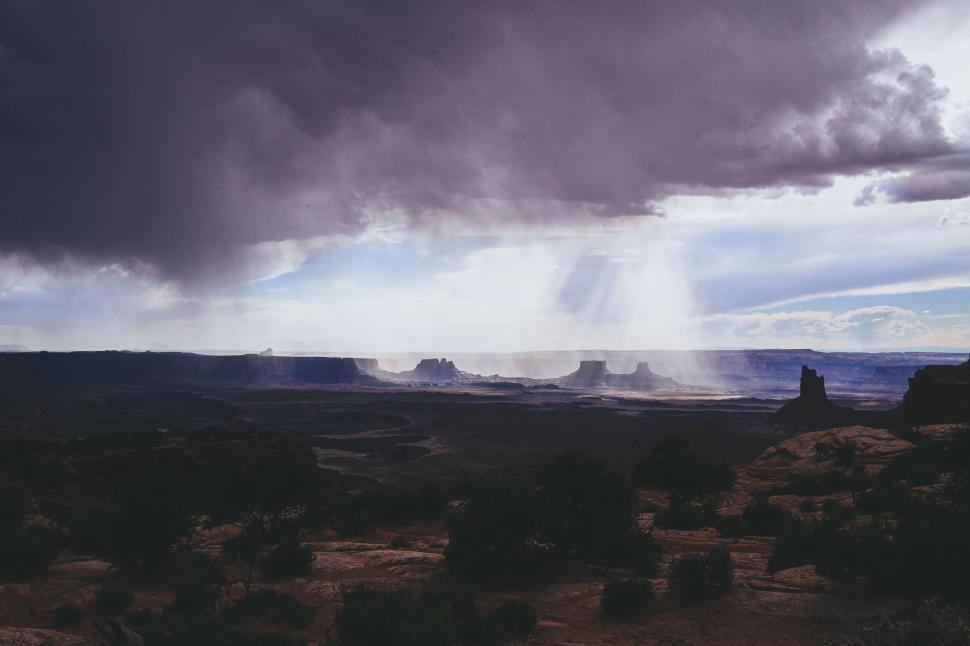 Free Image of Storm Moving Across Sky Over Desert 