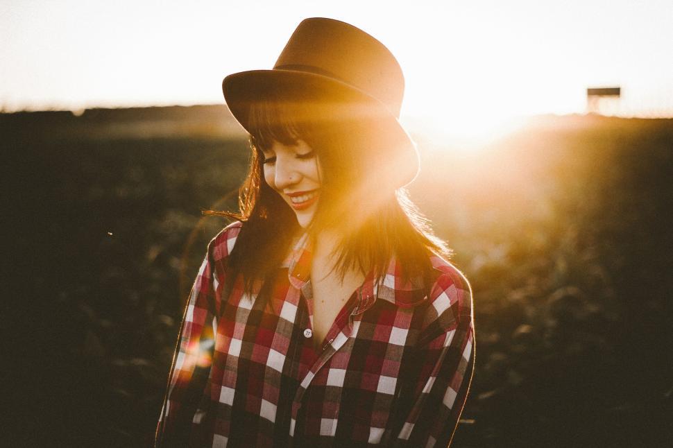 Free Image of Woman in Hat Standing in Field 