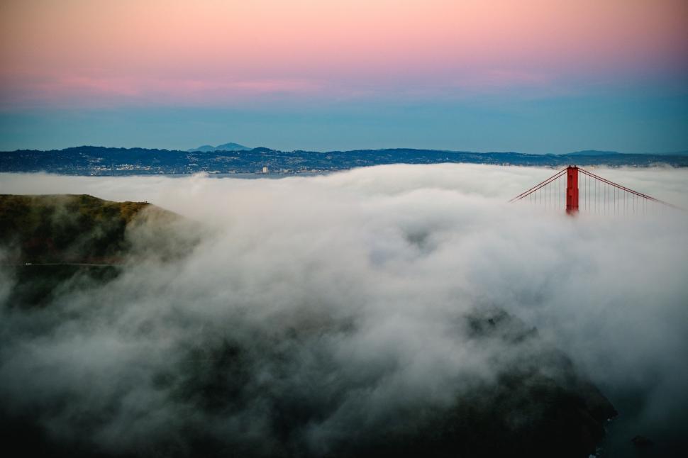 Free Image of The Golden Gate Bridge Enveloped by Clouds 