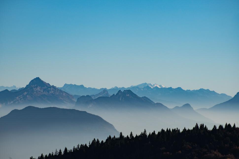Free Image of Fog Enveloping Mountain Range 