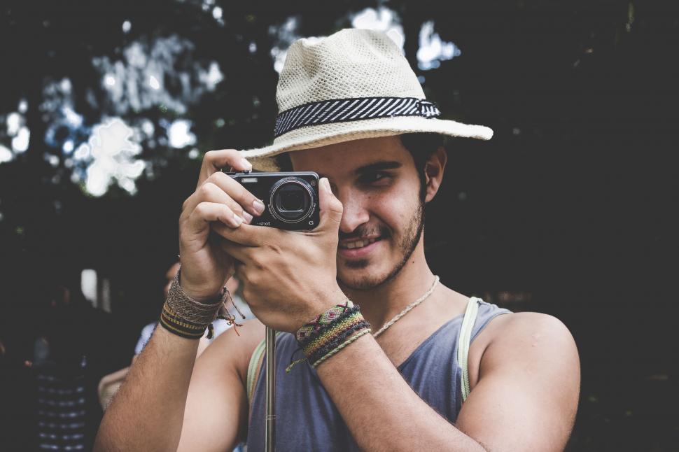 Free Image of Man Taking a Selfie With a Camera 