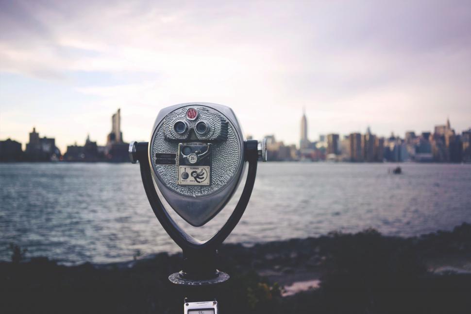 Free Image of Coin-Operated Parking Meter by Large Body of Water 