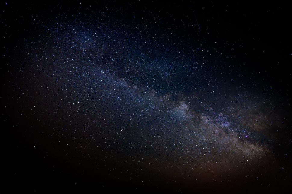 Free Image of Dark Sky Filled With Stars and Bright Light 