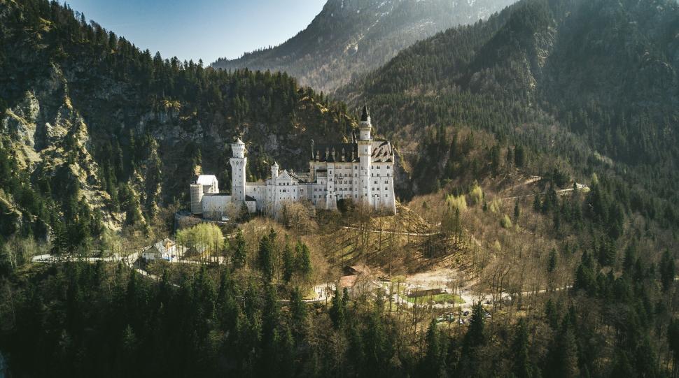 Free Image of Castle Amidst Mountain Range 