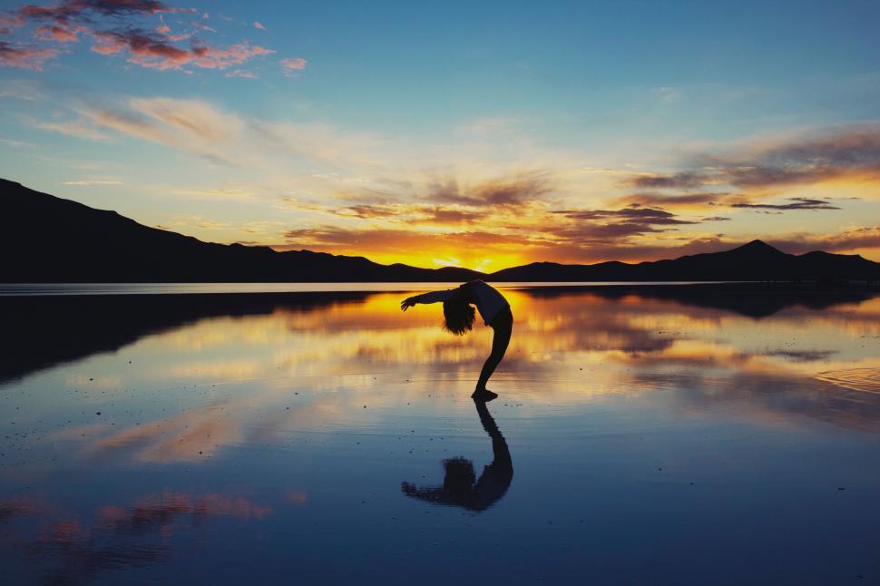Free Image of Person Performing Handstand by Lake 