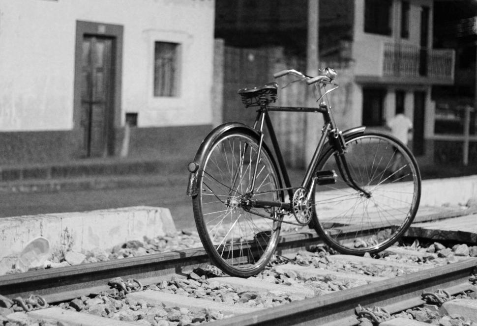 Free Image of Bike Parked on Train Track 