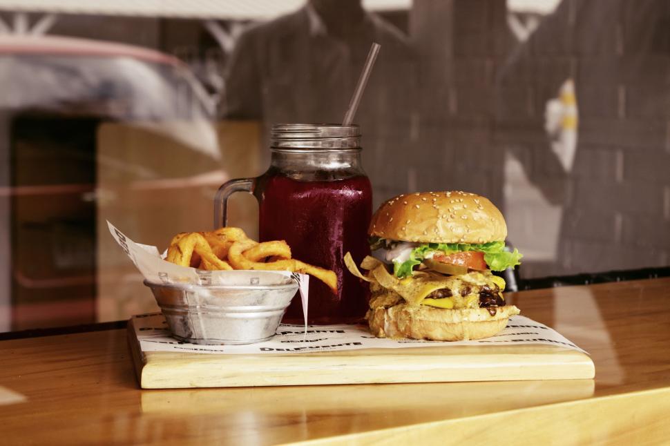Free Image of Hamburger and Fries on Table 
