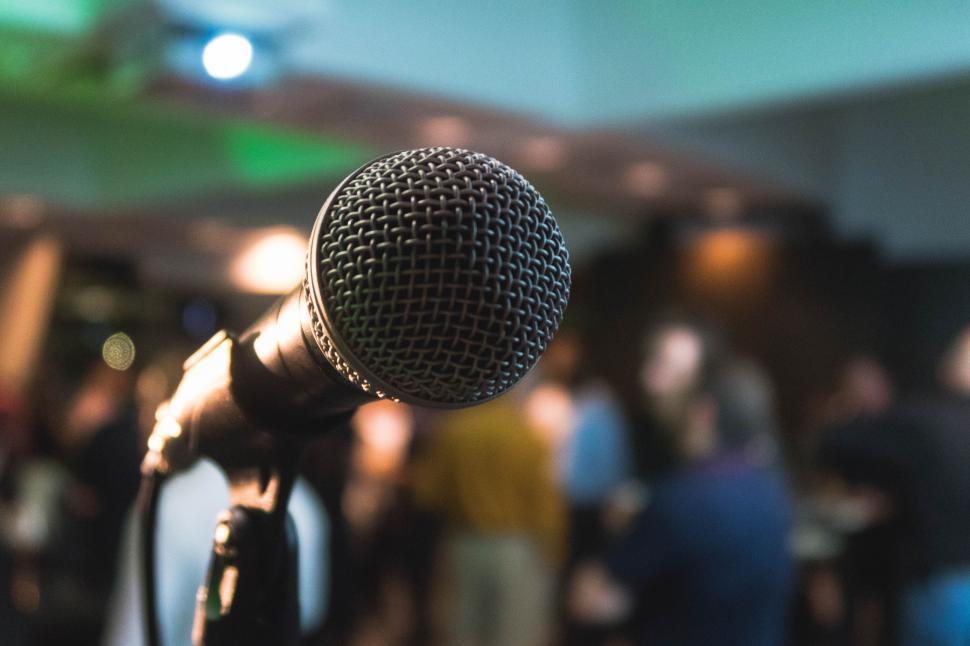 Free Image of Microphone in Front of Group of People 
